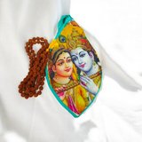A vibrant Radha Krishna Gomukhi Bag with a colorful digital print, perfect for storing Japa Mala beads or as a devotional accessory.