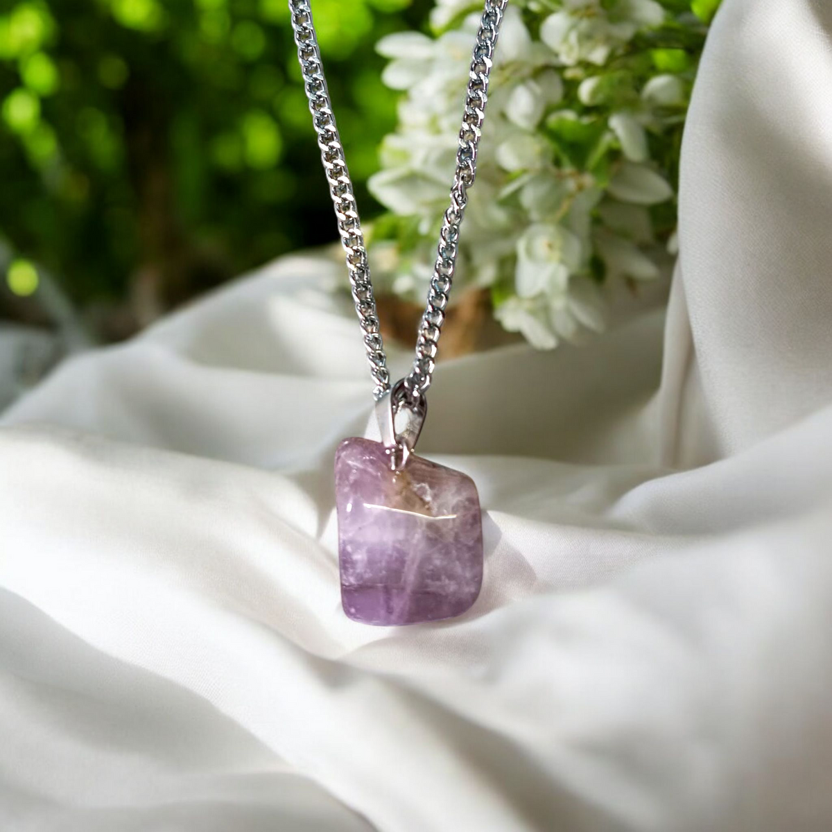 Amethyst Pendant – Natural Amethyst gemstone locket pendant on a chain, promoting emotional healing and spiritual awareness