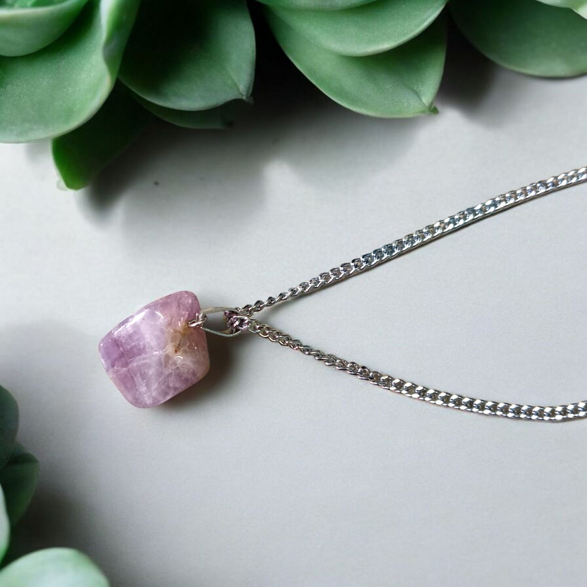 Amethyst Pendant – Natural Amethyst gemstone locket pendant on a chain, promoting emotional healing and spiritual awareness