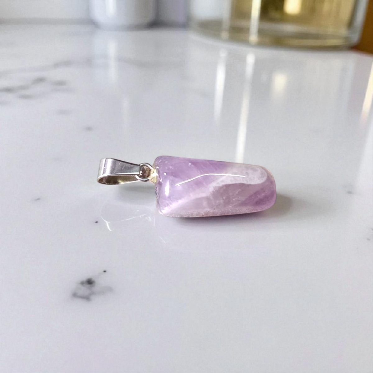 Amethyst Pendant – Natural Amethyst gemstone locket pendant on a chain, promoting emotional healing and spiritual awareness