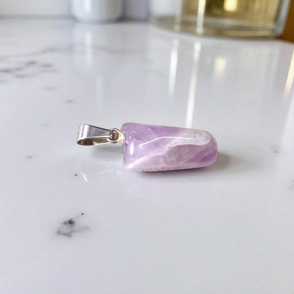 Amethyst Pendant – Natural Amethyst gemstone locket pendant on a chain, promoting emotional healing and spiritual awareness