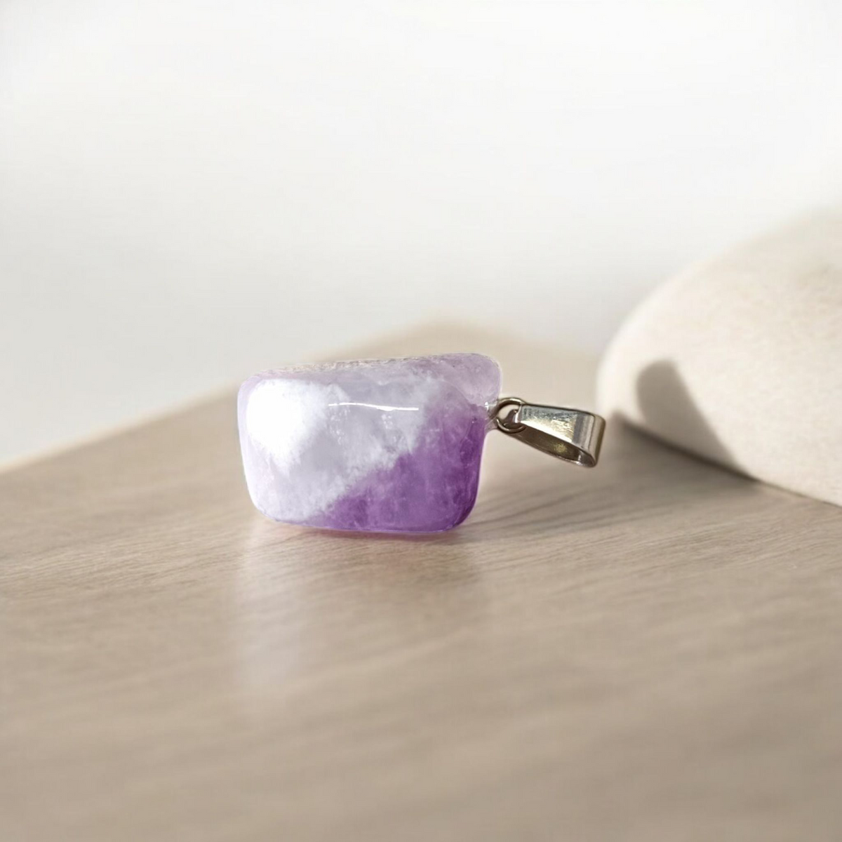 Amethyst Pendant – Natural Amethyst gemstone locket pendant on a chain, promoting emotional healing and spiritual awareness