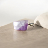 Amethyst Pendant – Natural Amethyst gemstone locket pendant on a chain, promoting emotional healing and spiritual awareness