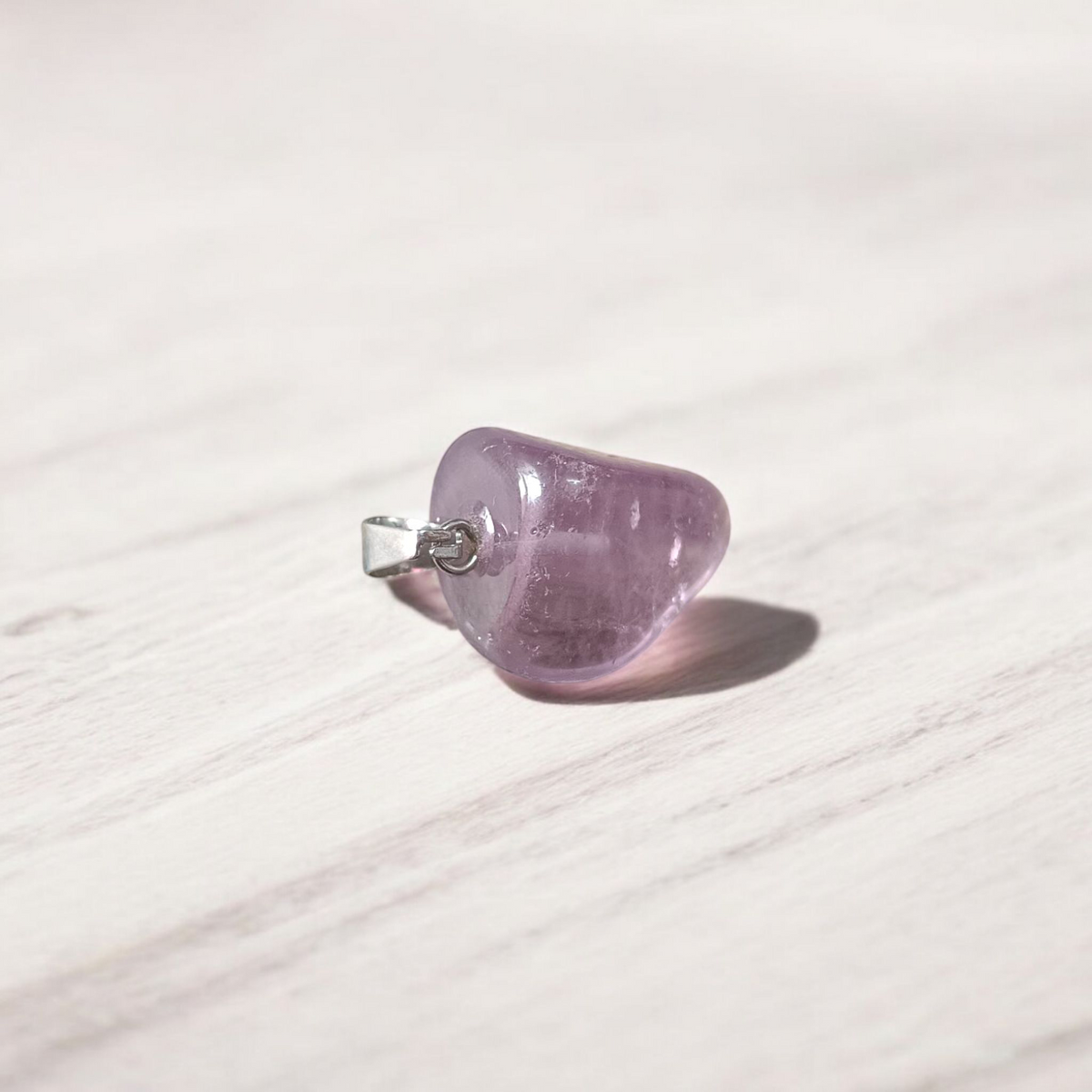 Amethyst Pendant – Natural Amethyst gemstone locket pendant on a chain, promoting emotional healing and spiritual awareness