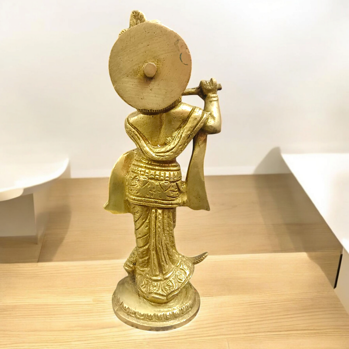 An elegant Brass Krishna Ji Murti, intricately designed, symbolizing devotion, love, and spiritual wisdom.