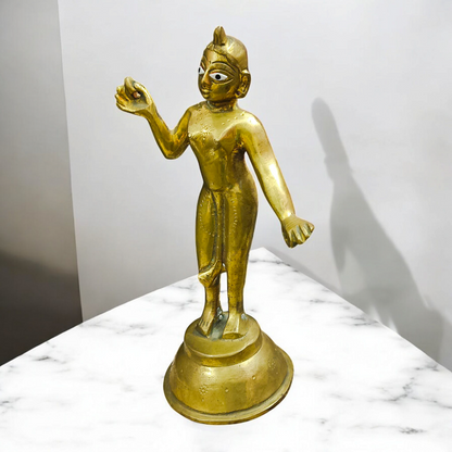 An intricately designed brass statue of Goddess Radha Rani, symbolizing divine love, purity, and devotion, perfect for worship or as a decorative piece.

