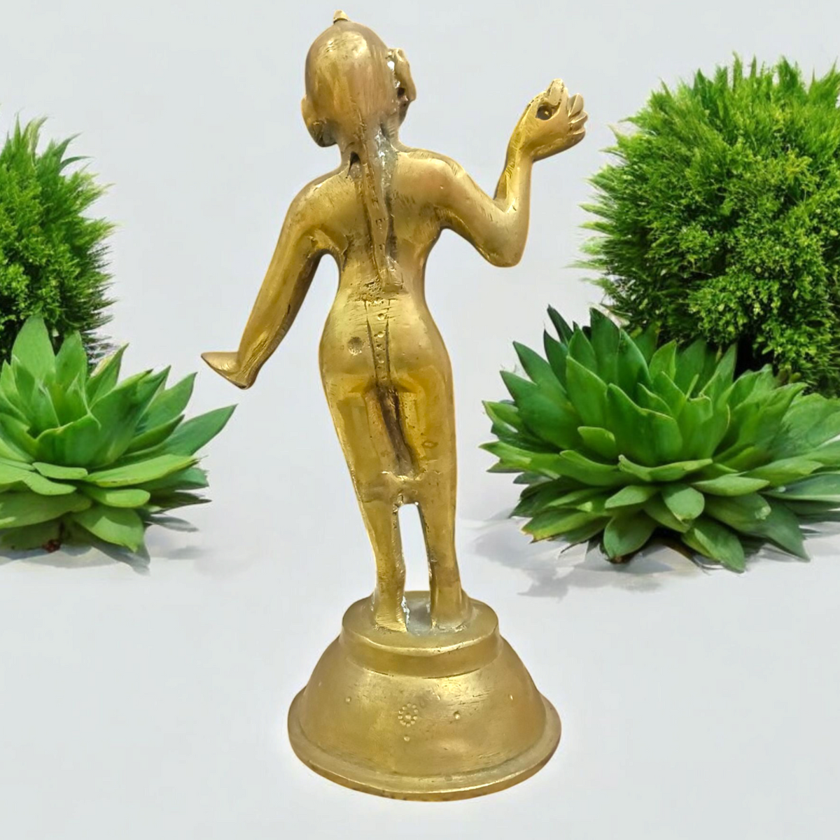 An intricately designed brass statue of Goddess Radha Rani, symbolizing divine love, purity, and devotion, perfect for worship or as a decorative piece.

