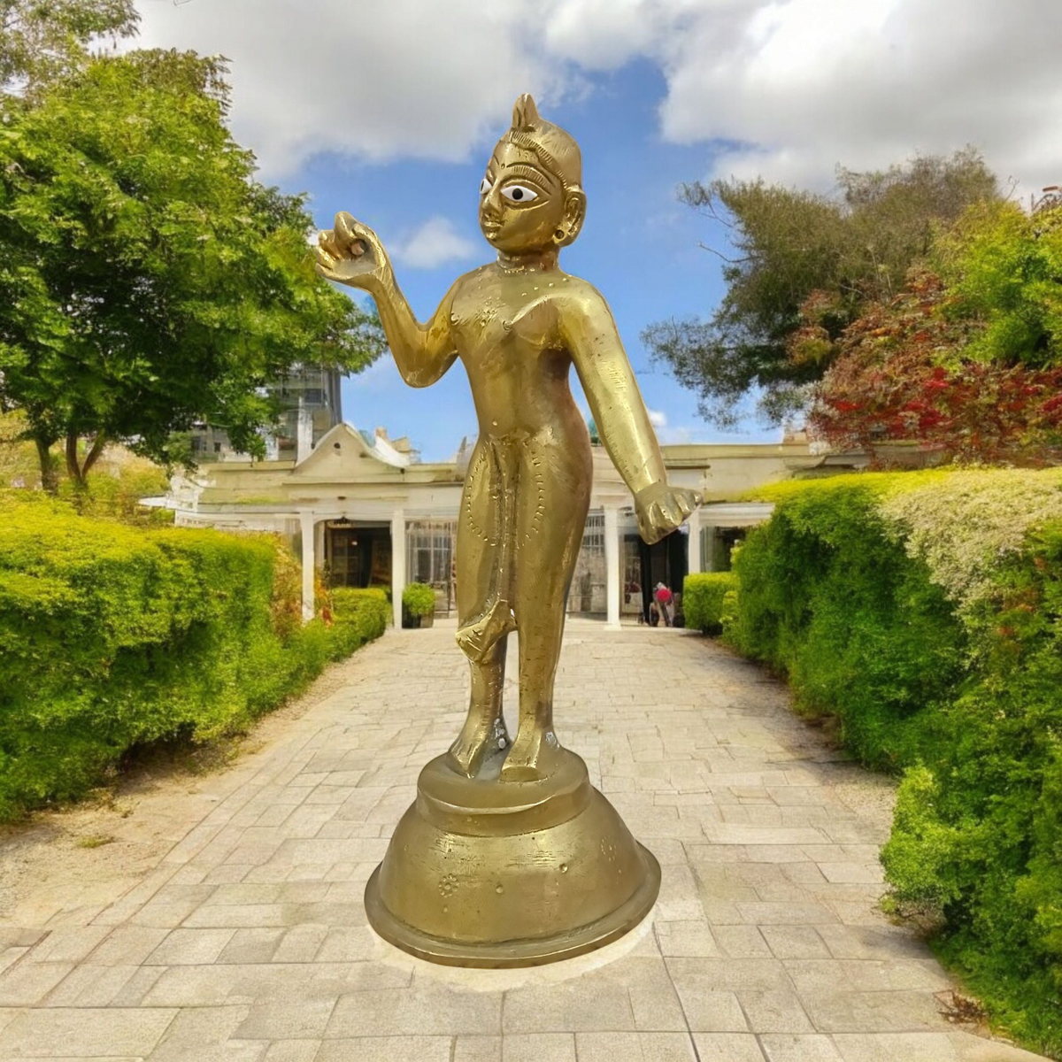 An intricately designed brass statue of Goddess Radha Rani, symbolizing divine love, purity, and devotion, perfect for worship or as a decorative piece.

