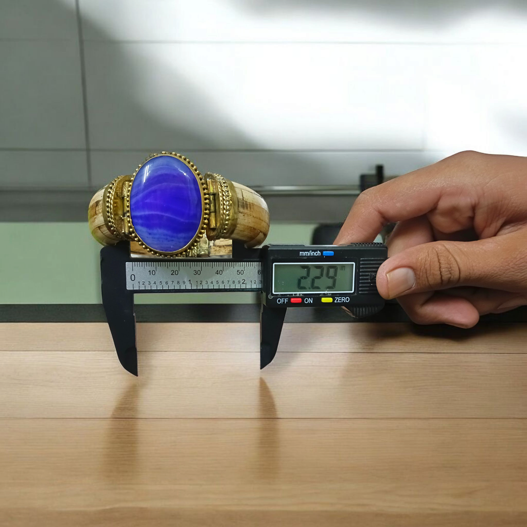 Antique-style Blue Hakik (Blue Agate) bracelet with stretchable band and lab certification, shown on a clean, neutral background