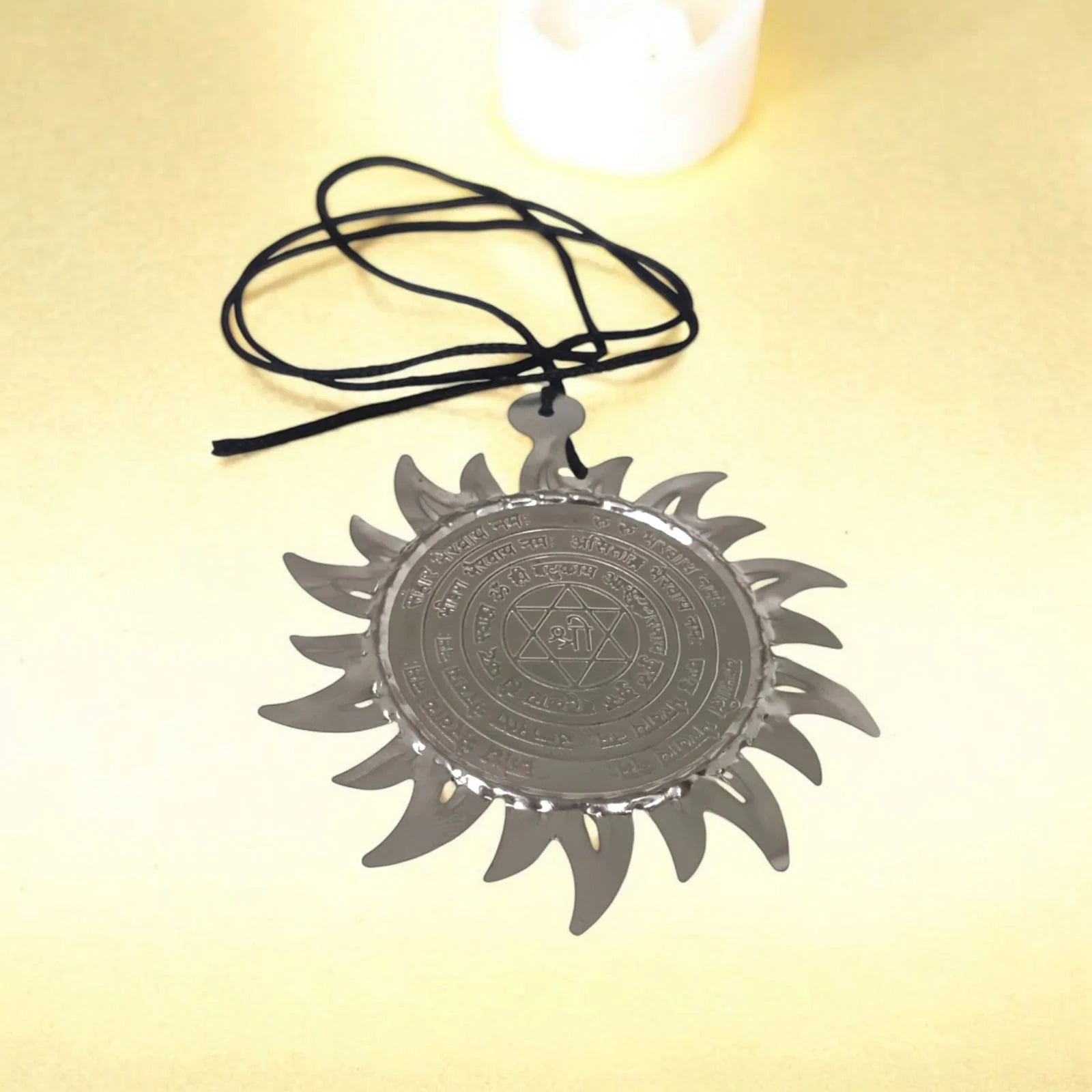 Ashtabhairav Yantra for protection, designed to be hung with a black thread, perfect for home and office to ward off negative energies.