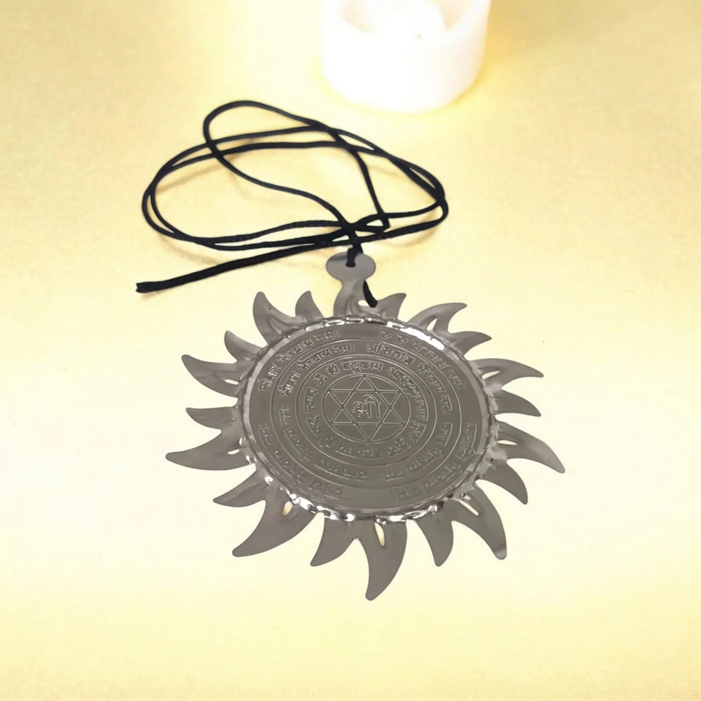 Ashtabhairav Yantra for protection, designed to be hung with a black thread, perfect for home and office to ward off negative energies.