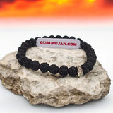 Black 5 Mukhi Rudraksha Bracelet with 7MM beads, lab certified, stretchable design, offering Shiva’s blessings and spiritual growth.