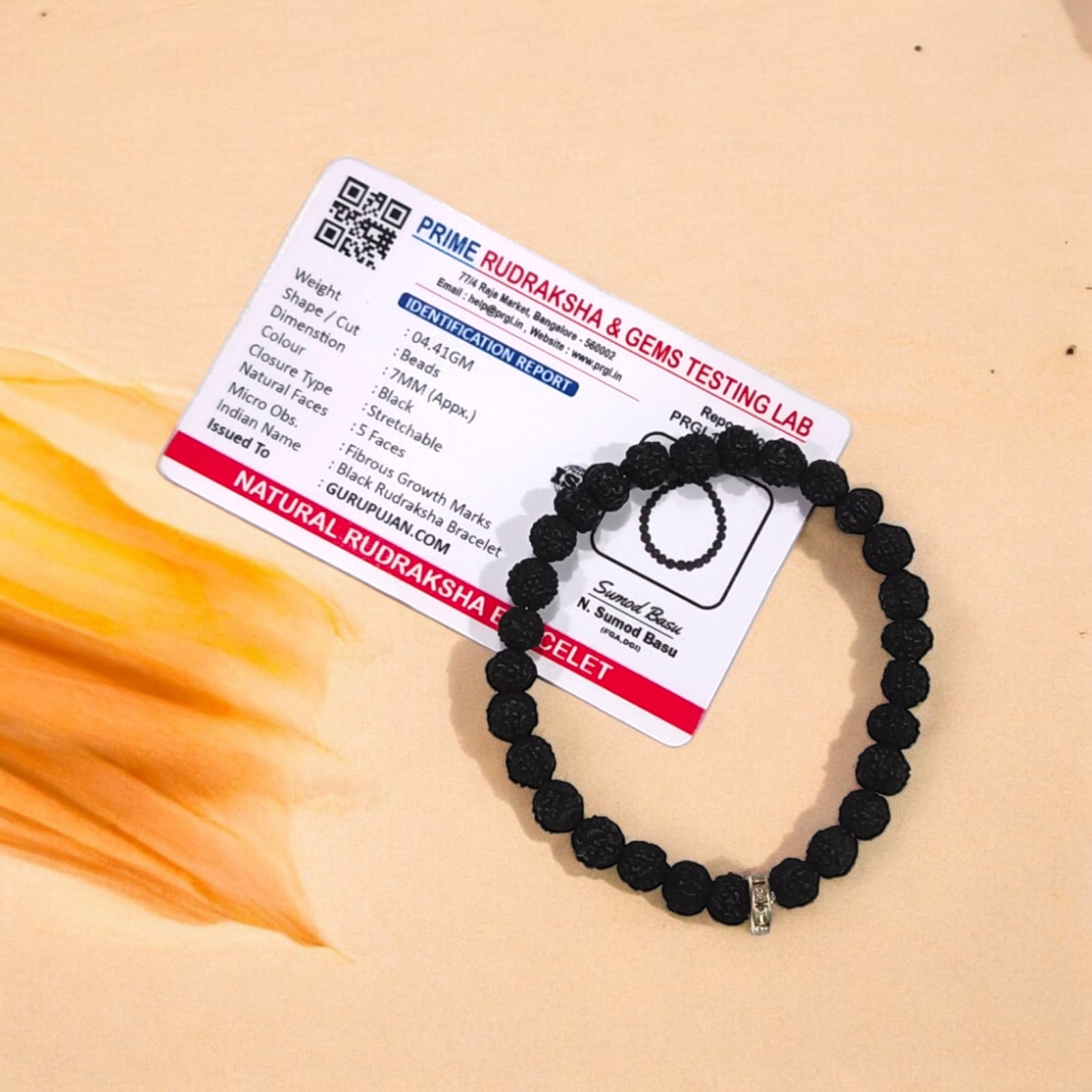 Black 5 Mukhi Rudraksha Bracelet with 7MM beads, lab certified, stretchable design, offering Shiva’s blessings and spiritual growth.
