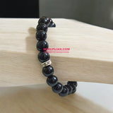 Black Agate Bracelet with 8MM natural beads, lab certified, stretchable design, offering protection, grounding, and courage.