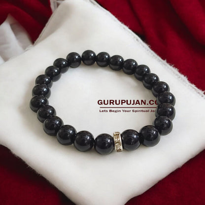 Black Agate Bracelet with 8MM natural beads, lab certified, stretchable design, offering protection, grounding, and courage.