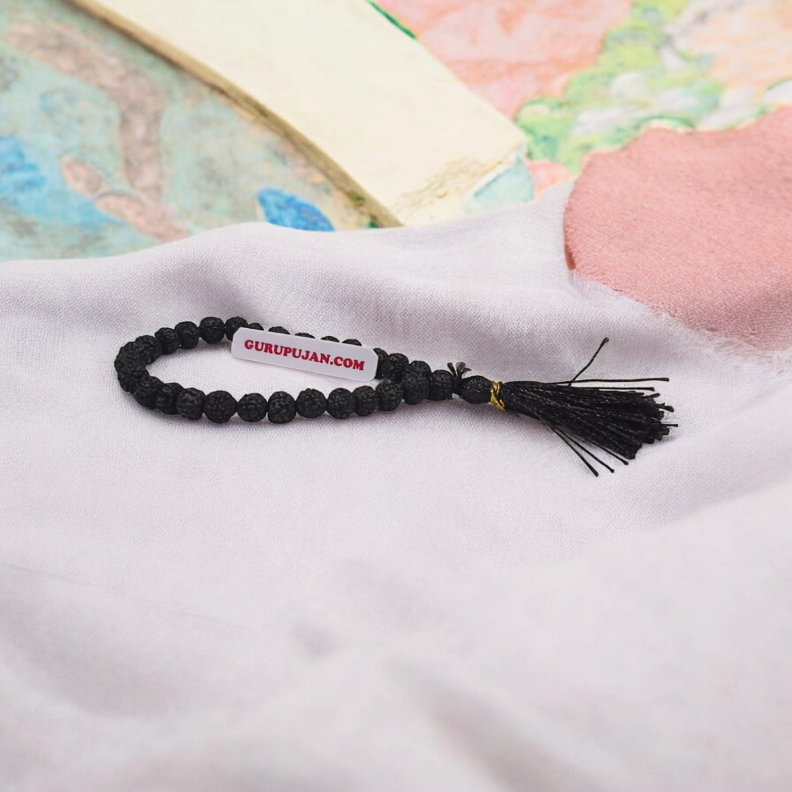 Black Rudraksha Mala 27+1 Beads, 6MM 5 Mukhi Rudraksha Jaap Mala by Gurupujan, ideal for chanting and meditation while traveling or at work.