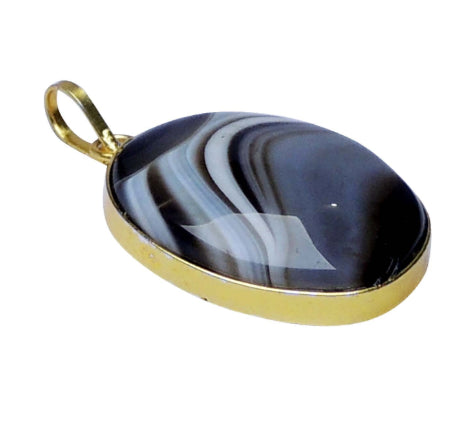 Black Sulemani Hakik Pendant with black thread, offering spiritual protection, healing, and emotional balance.