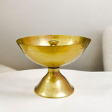 Brass Akhand Jyot diya with heavy base for steady flame, designed for pooja and aarti rituals, creating a spiritual and peaceful environment.