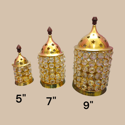 Brass Crystal Akhand Jyot with a crystal pillar design and brass base, perfect for temple pooja and home decor.