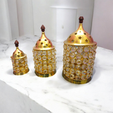 Brass Crystal Akhand Jyot with a crystal pillar design and brass base, perfect for temple pooja and home decor.