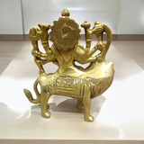 Brass Durga Mata Murti, depicting Goddess Durga on a lion, intricately crafted for worship and spiritual protection.