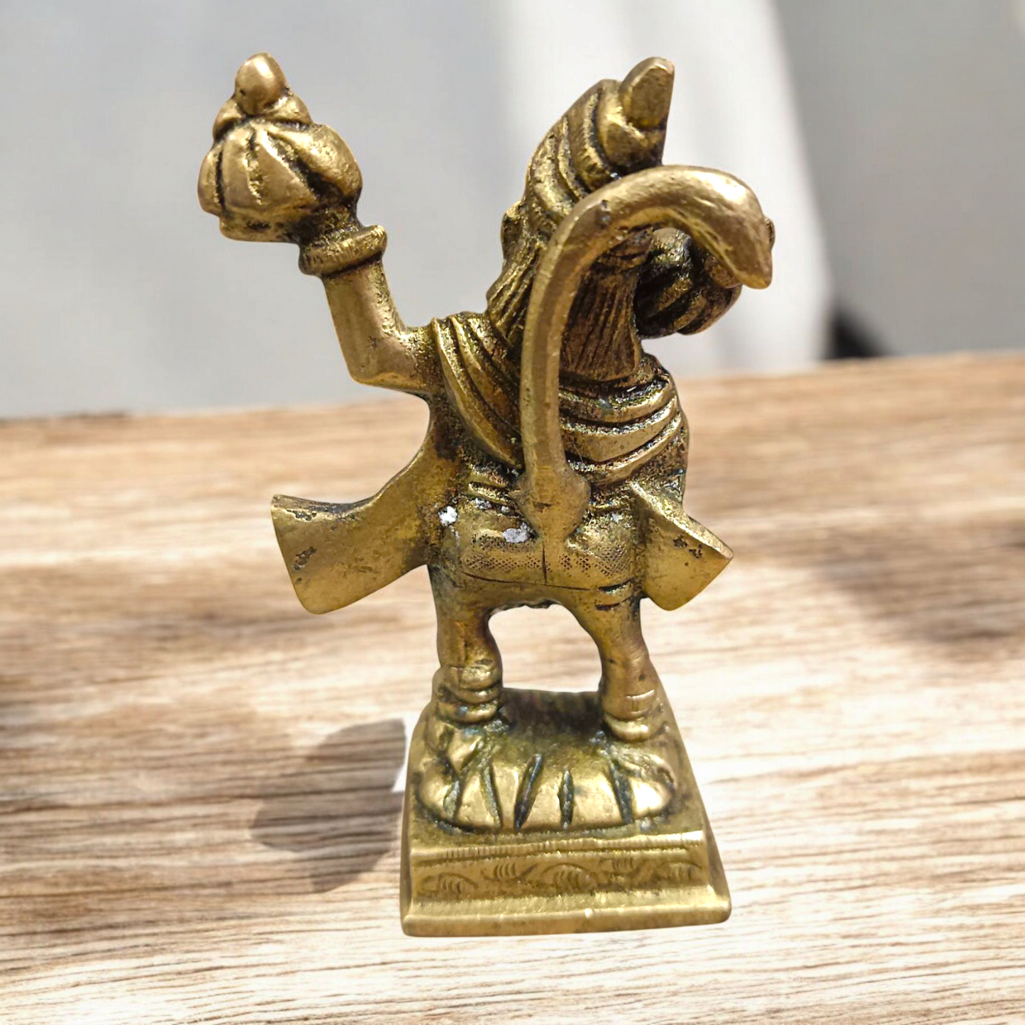 Brass Hanuman Ji Idol carrying the Sanjeevani mountain, symbolizing strength, devotion, and divine protection.