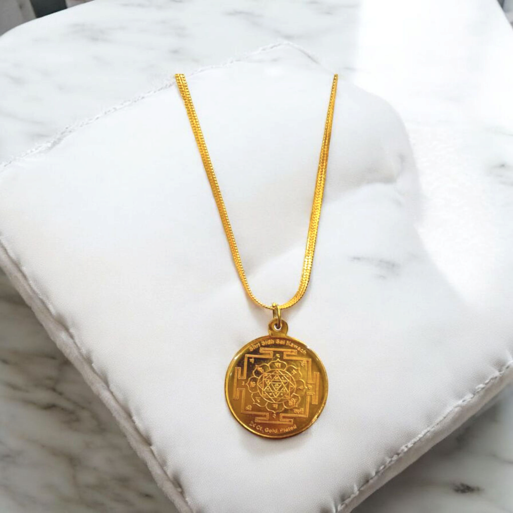 Brass Sai Baba Kawach pendant with chain, offering divine protection and blessings for the wearer, symbolizing faith and devotion.