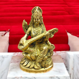 Brass Saraswati Murti Idol, a beautifully detailed statue of Goddess Saraswati, made from brass, with intricate craftsmanship, holding a veena.