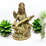 Brass Saraswati Murti Idol, a beautifully detailed statue of Goddess Saraswati, made from brass, with intricate craftsmanship, holding a veena.