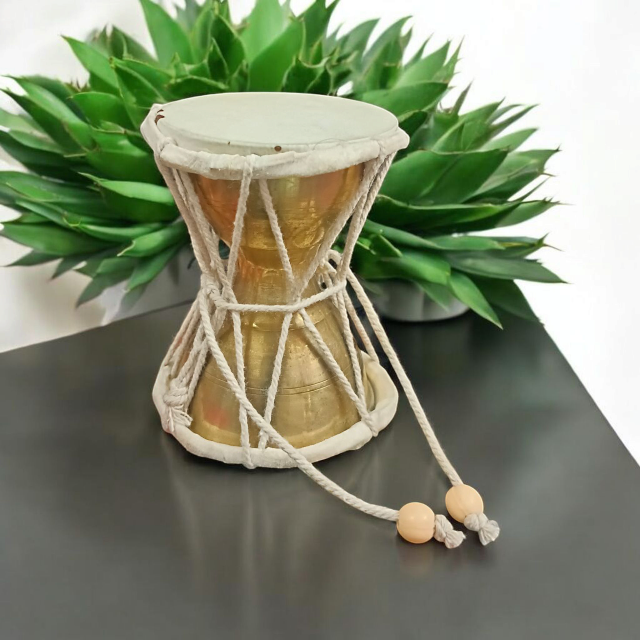 Brass Shiv Ji Damru used in spiritual rituals and Shiv Puja, handcrafted with premium quality brass