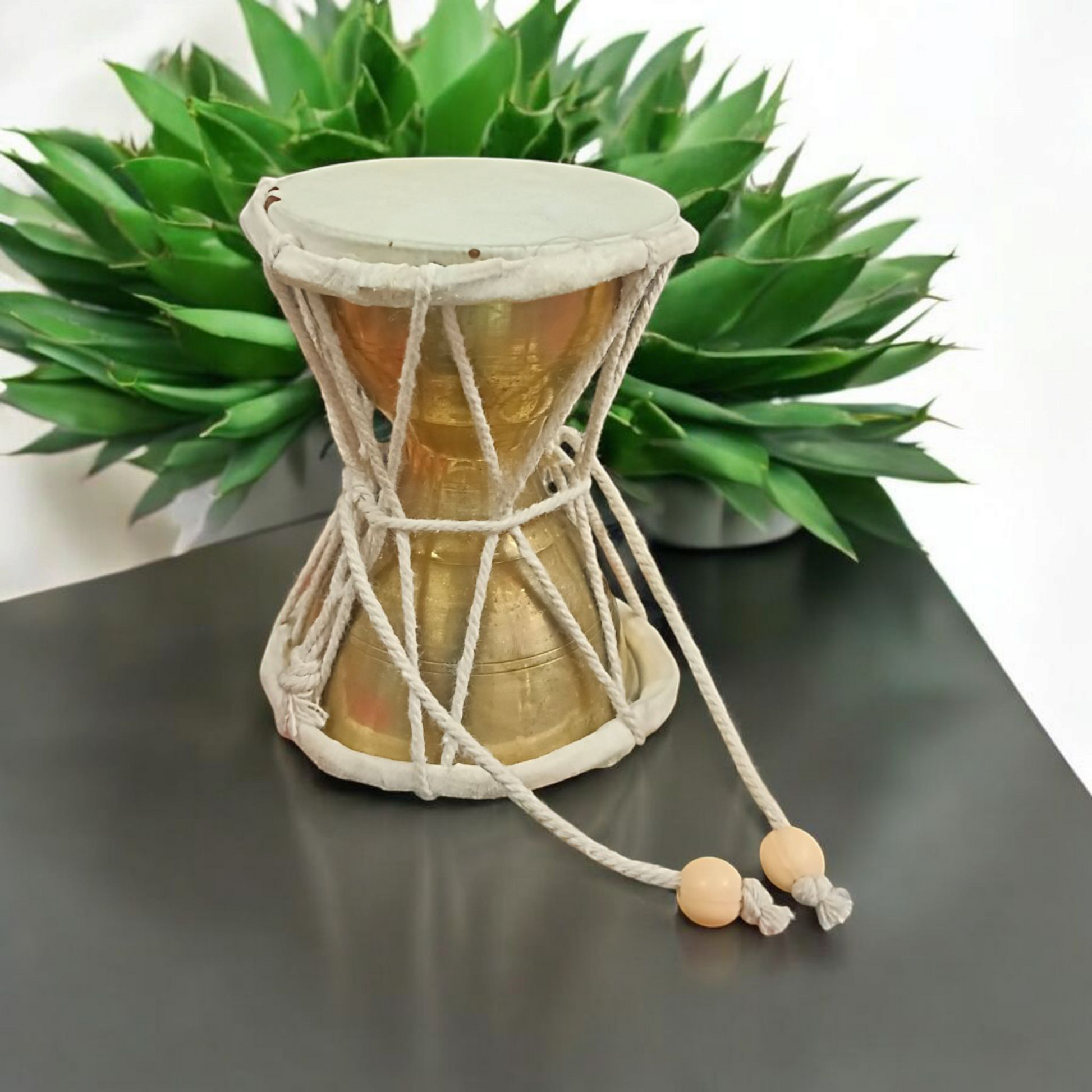 Brass Shiv Ji Damru used in spiritual rituals and Shiv Puja, handcrafted with premium quality brass