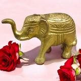 Brass elephant statue symbolizing wisdom, success, and prosperity, intricately crafted for office decor.