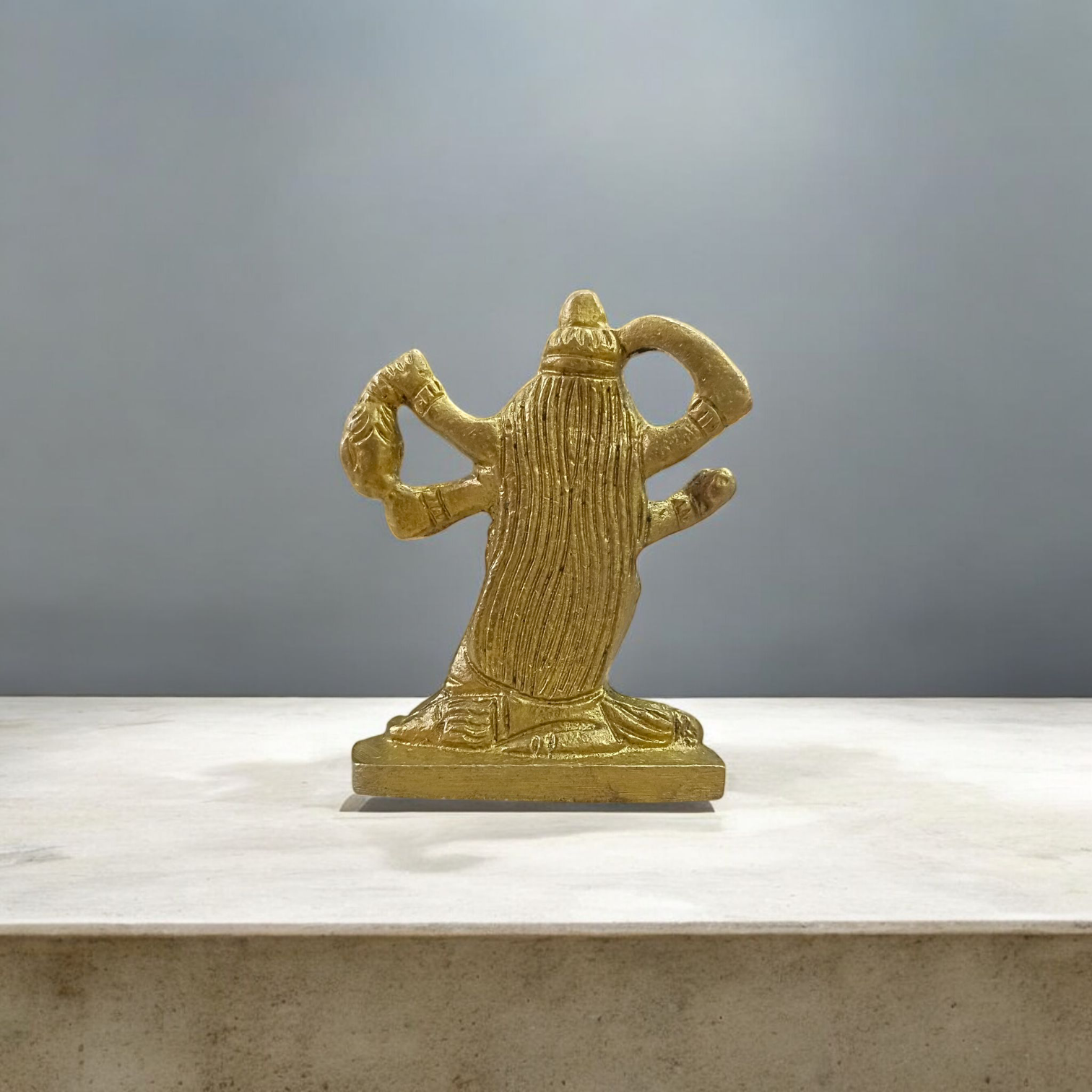 Brass idol of Goddess Kali in traditional fierce form, ideal for worship, spiritual rituals, and protection in home or temple
