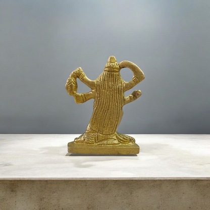 Brass idol of Goddess Kali in traditional fierce form, ideal for worship, spiritual rituals, and protection in home or temple