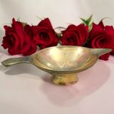 Brass oil lamp (Brass Jyot) designed for pooja rituals, showcasing a steady flame with a traditional and elegant design.