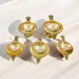 Brass oil lamp (Brass Jyot) designed for pooja rituals, showcasing a steady flame with a traditional and elegant design.