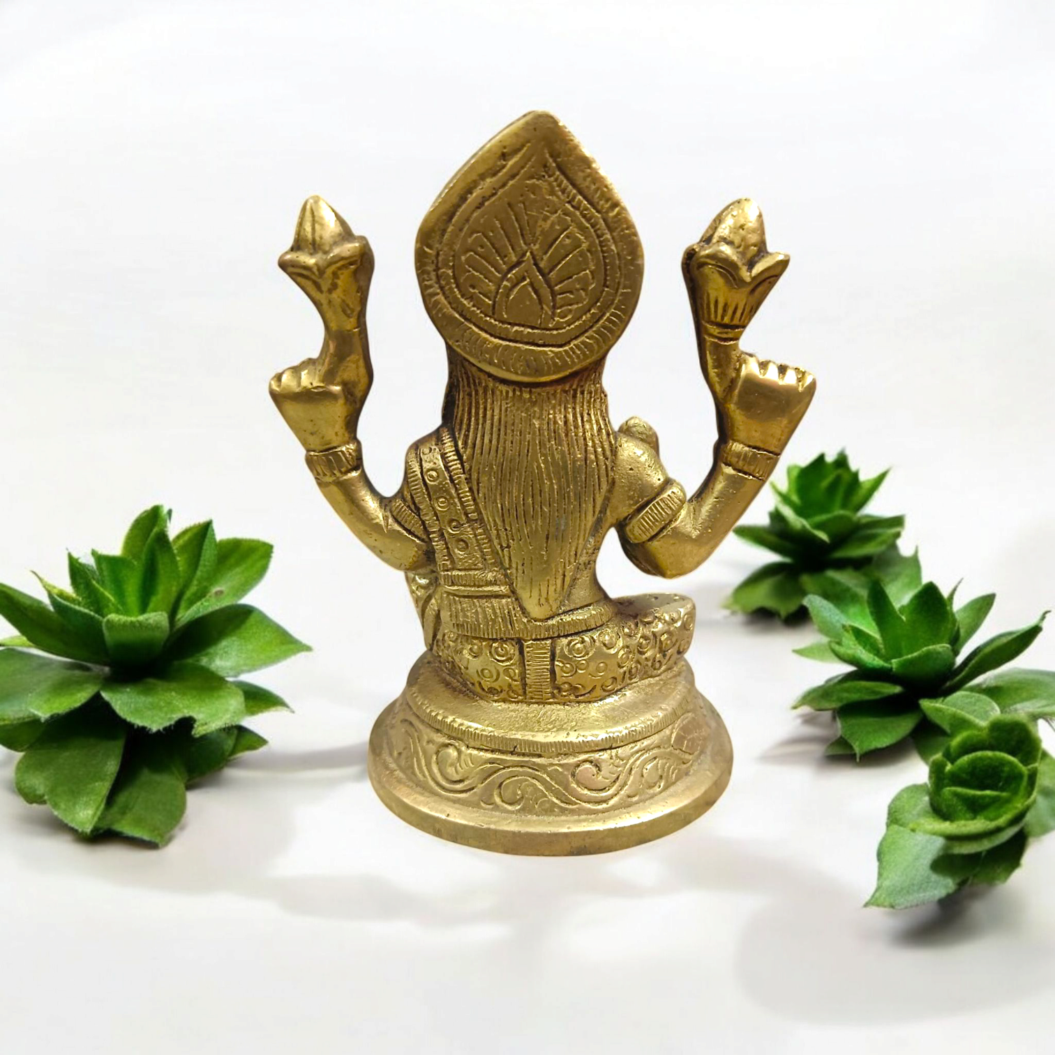 Brass statue of Goddess Lakshmi symbolizing wealth, prosperity, and abundance, finely crafted with intricate details.