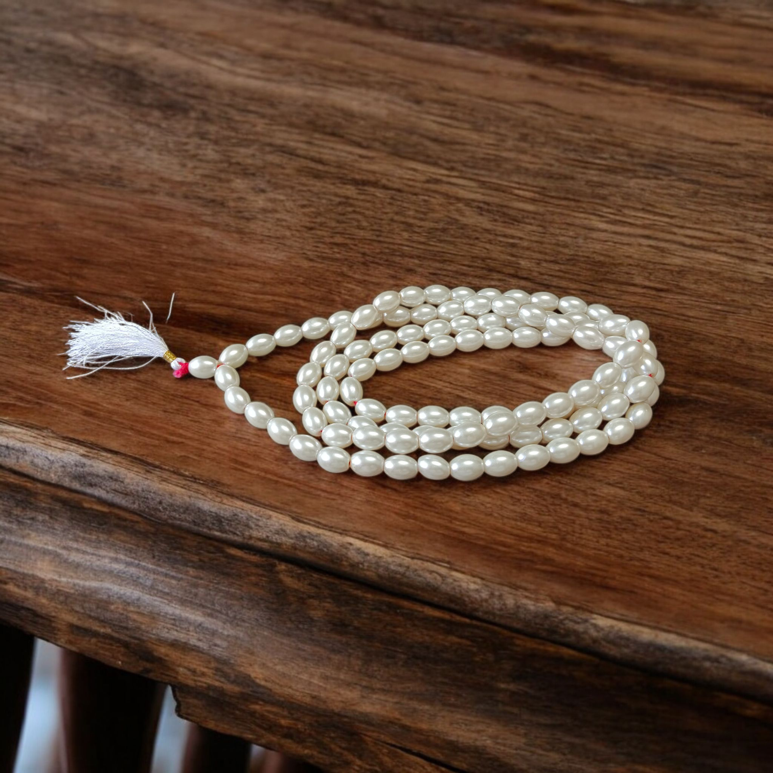 Buy lab-certified Natural Pearl Mala 108+1 Beads (10–11mm) from GuruPujan. Experience peace, positivity, and emotional balance with this pure Moti Mala