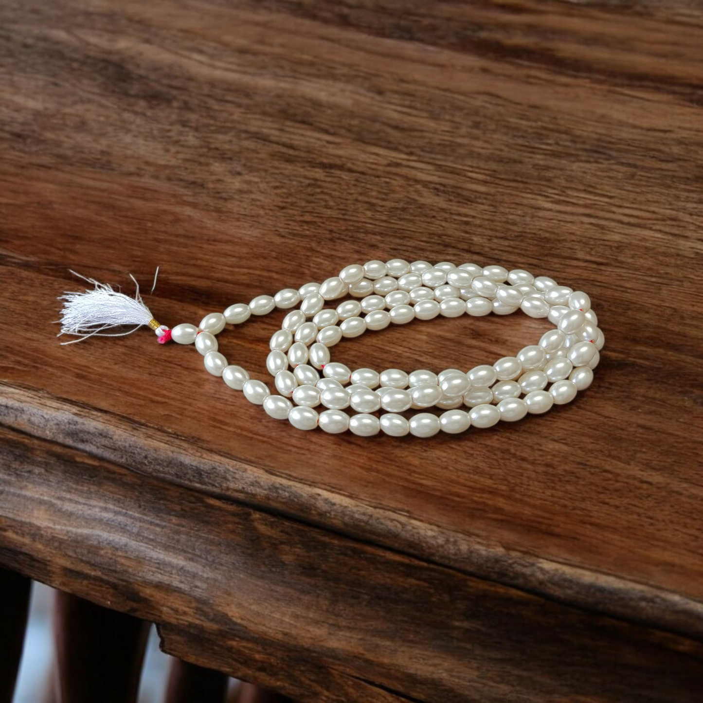 Buy lab-certified Natural Pearl Mala 108+1 Beads (10–11mm) from GuruPujan. Experience peace, positivity, and emotional balance with this pure Moti Mala