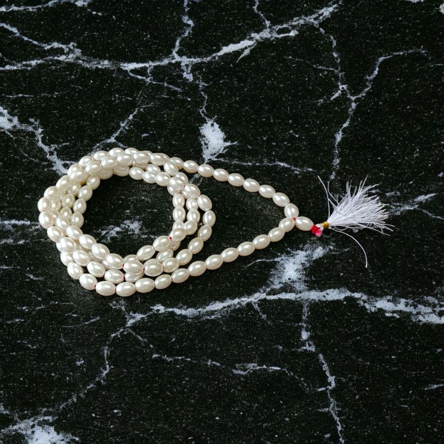 Buy lab-certified Natural Pearl Mala 108+1 Beads (10–11mm) from GuruPujan. Experience peace, positivity, and emotional balance with this pure Moti Mala