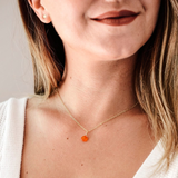 Carnelian Stone Pendant made from raw Carnelian crystal on a chain, designed to boost energy, creativity, and emotional balance.