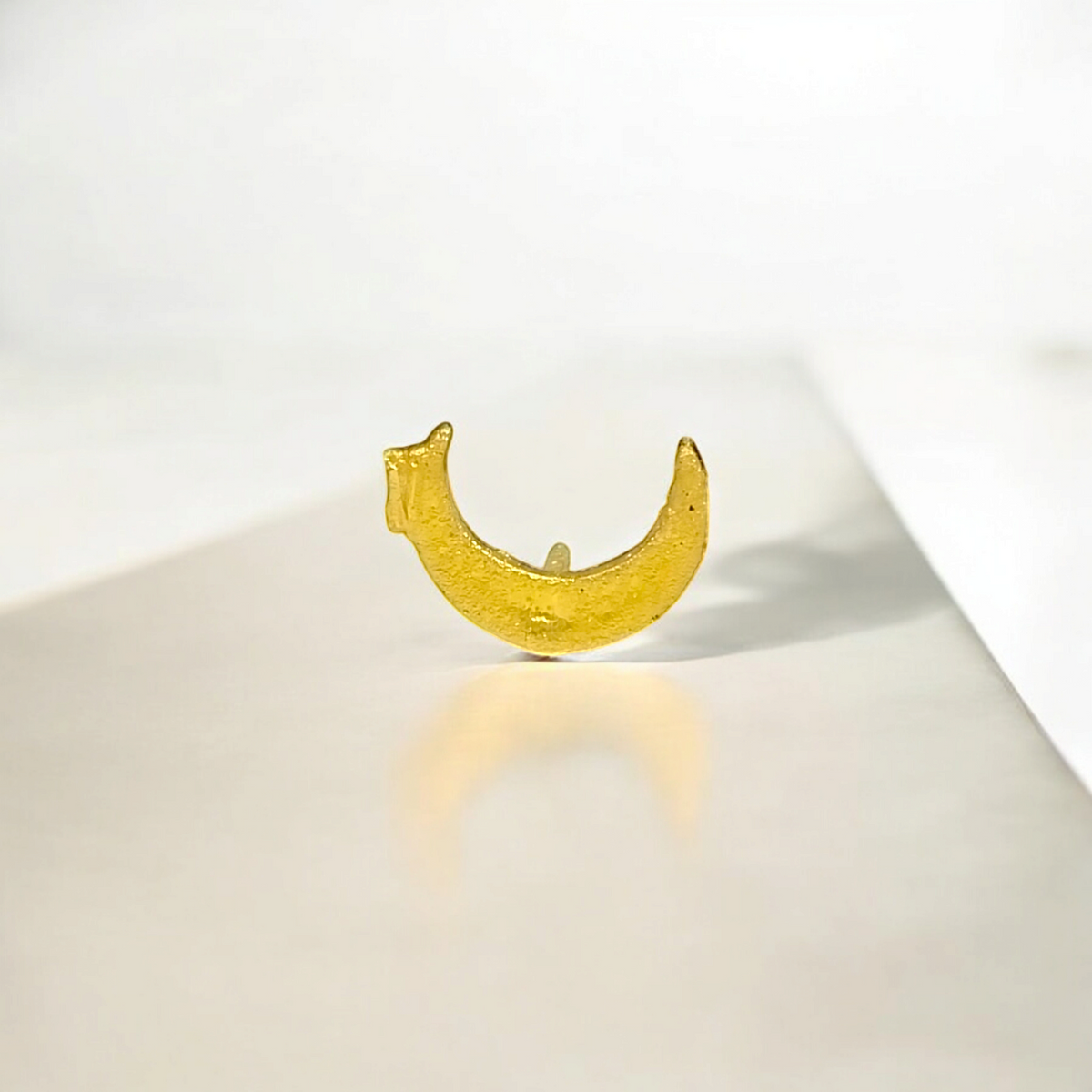 Chand Tilak stamp applied to the forehead, symbolizing auspiciousness and purity in spiritual practices.