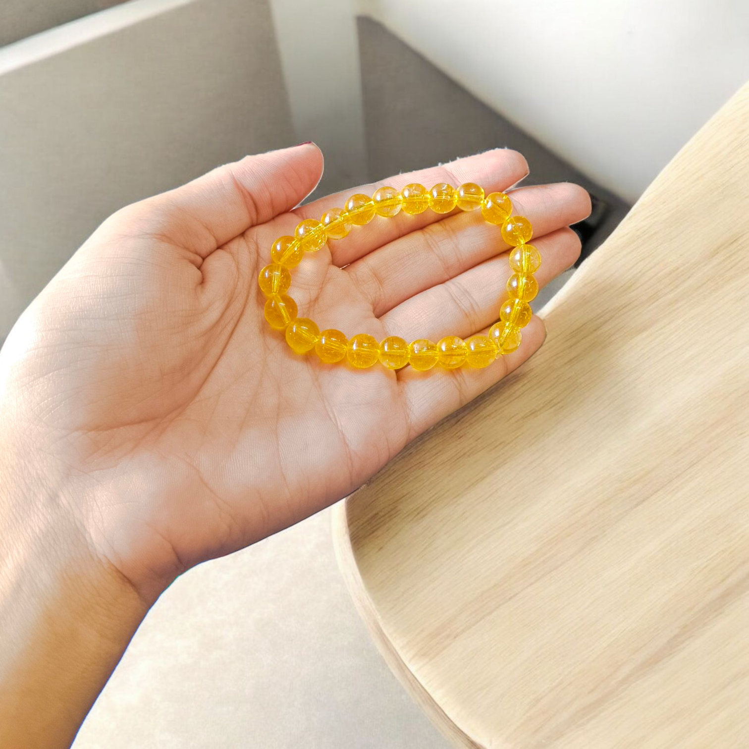 Close-up image of Natural Citrine Diamond-cut Bracelet with 8mm stretchable beads, ideal for success, prosperity, and manifestation