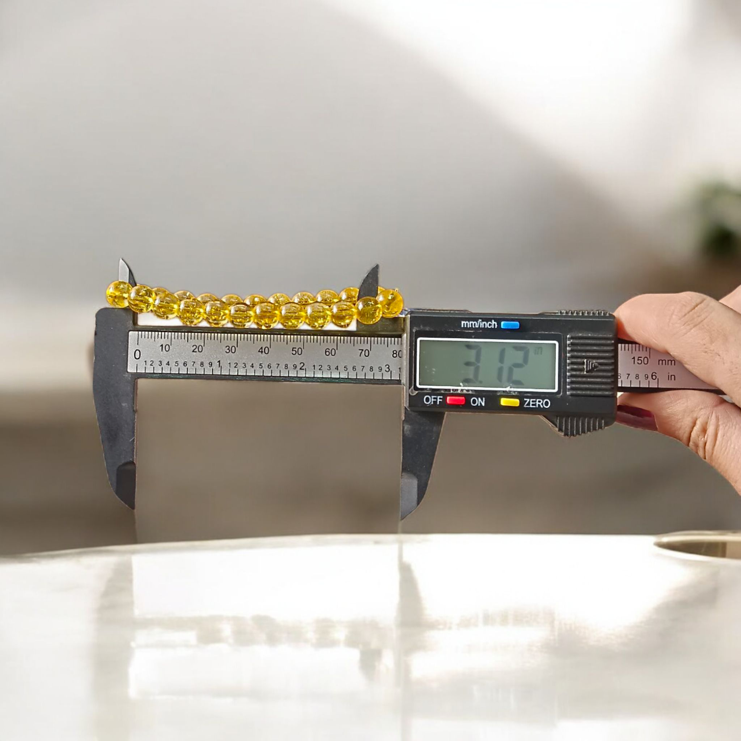 Close-up image of Natural Citrine Diamond-cut Bracelet with 8mm stretchable beads, ideal for success, prosperity, and manifestation