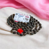 Close-up image of Original Kamal Gutta Mala made of pure lotus seeds, ideal for Lakshmi and Durga worship, available in 27+1 and 108+1 variants