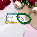 Close-up image of a Green Onyx Bracelet featuring polished 8mm beads on a stretchable band