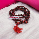 Close-up of Natural Lal Chandan Mala with rich red sandalwood beads used for meditation and spiritual rituals