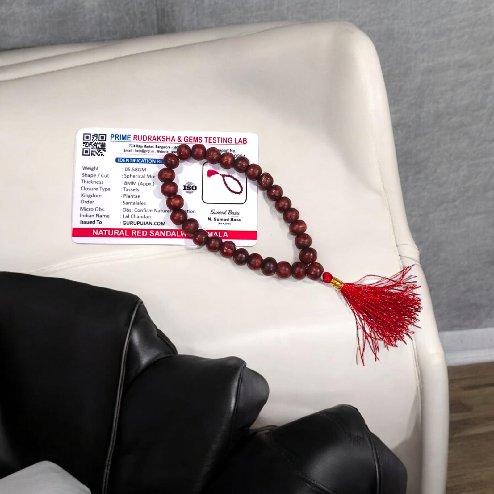 Close-up of Natural Lal Chandan Mala with rich red sandalwood beads used for meditation and spiritual rituals