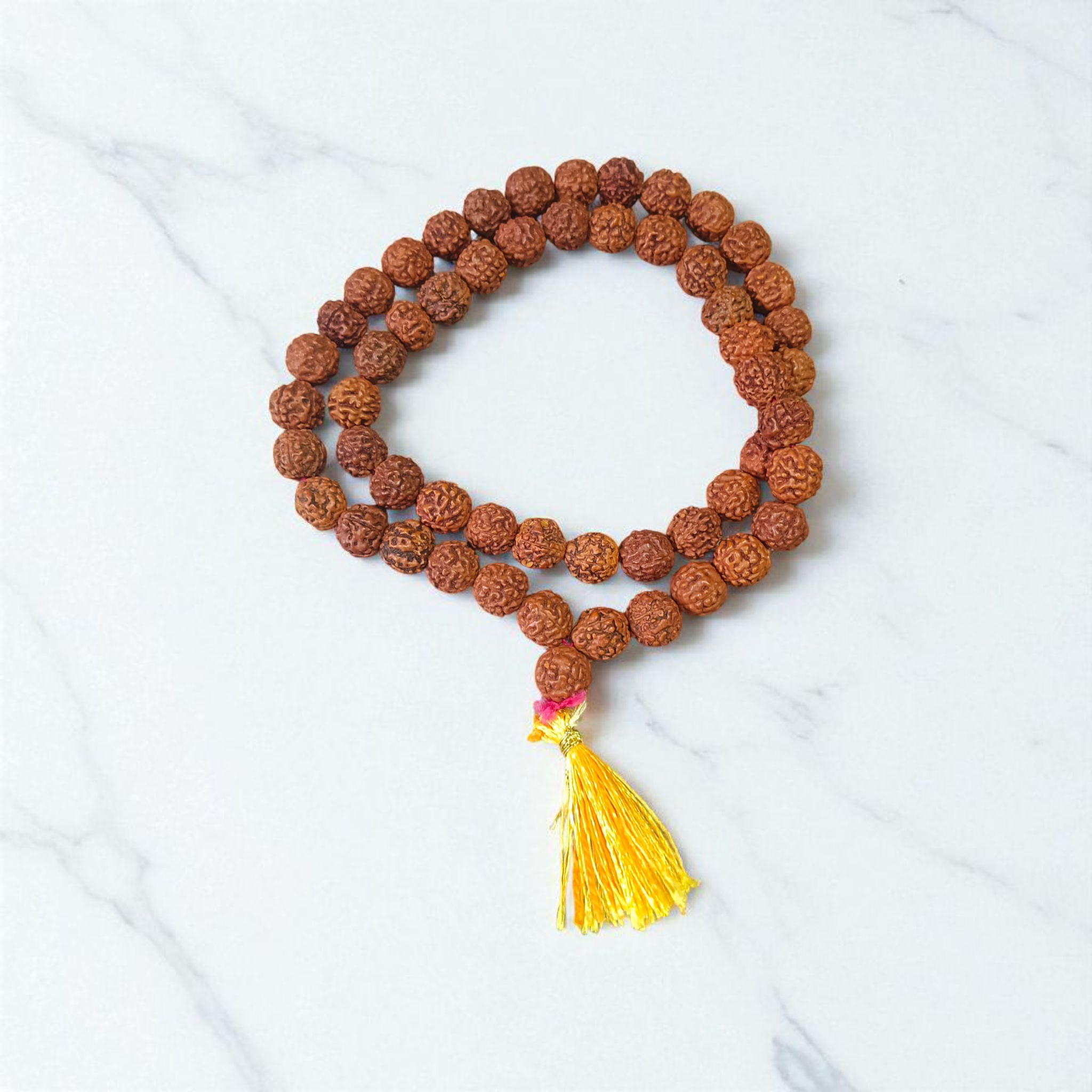 Close-up of a 54+1 bead Natural Rudraksha Mala with 8mm lab-certified beads
