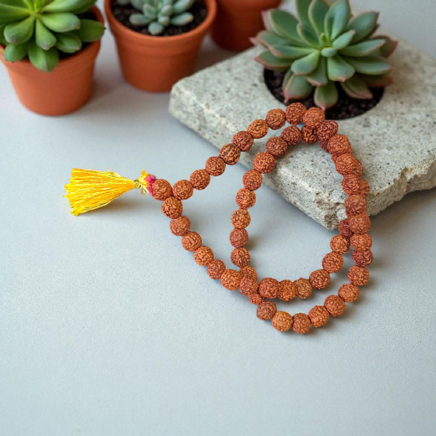 Close-up of a 54+1 bead Natural Rudraksha Mala with 8mm lab-certified beads